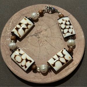 Conus Marmoreus shell bracelet 9”